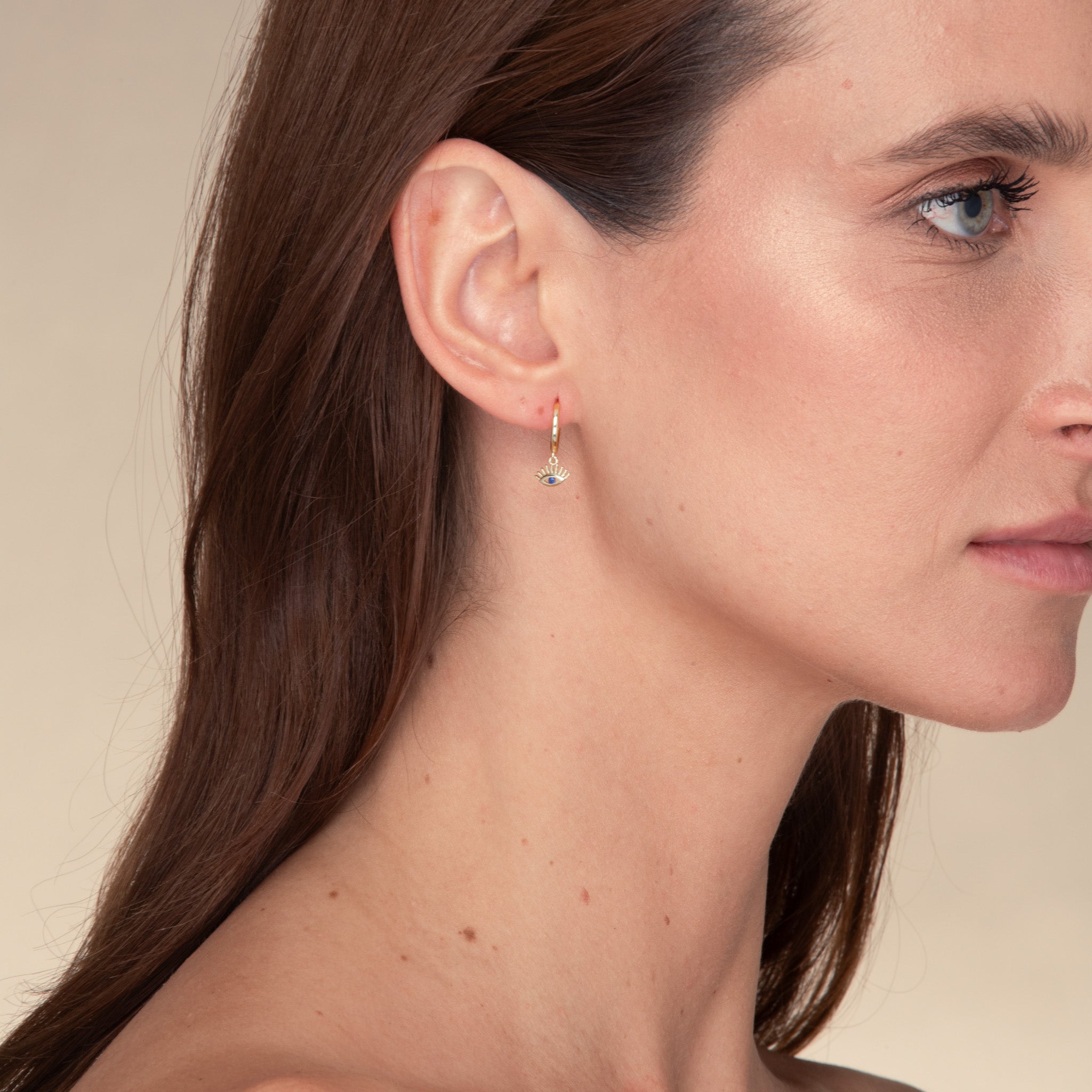 Evil Eye Symbolic Blue Huggie Earrings - Camile & Stone