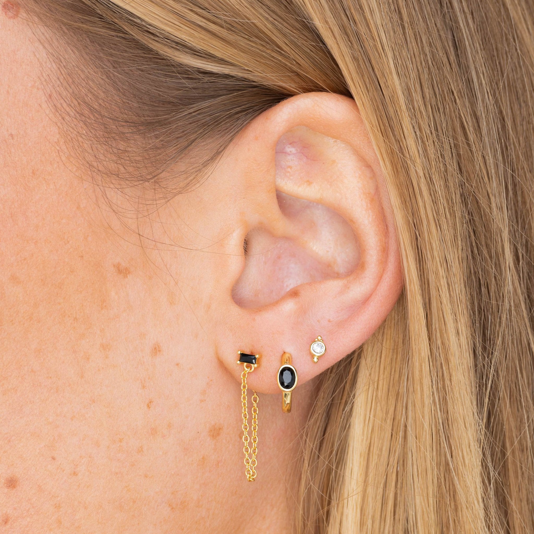 Black Oval Sapphire Huggie Earrings - Camile & Stone